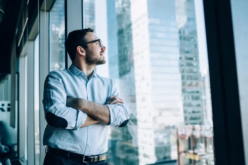 adobestock_307771829_man-looking-thru-window-1024x683